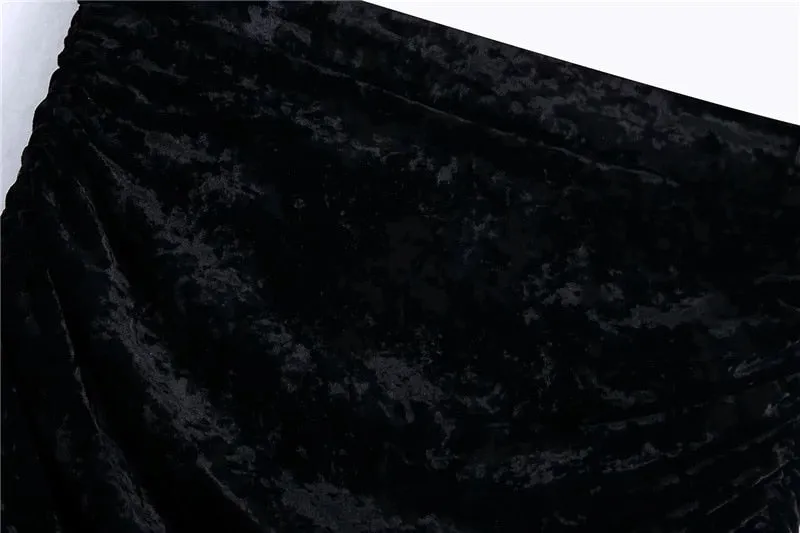 PLEATED VELVET ASYMMETRICAL MINI SKIRT